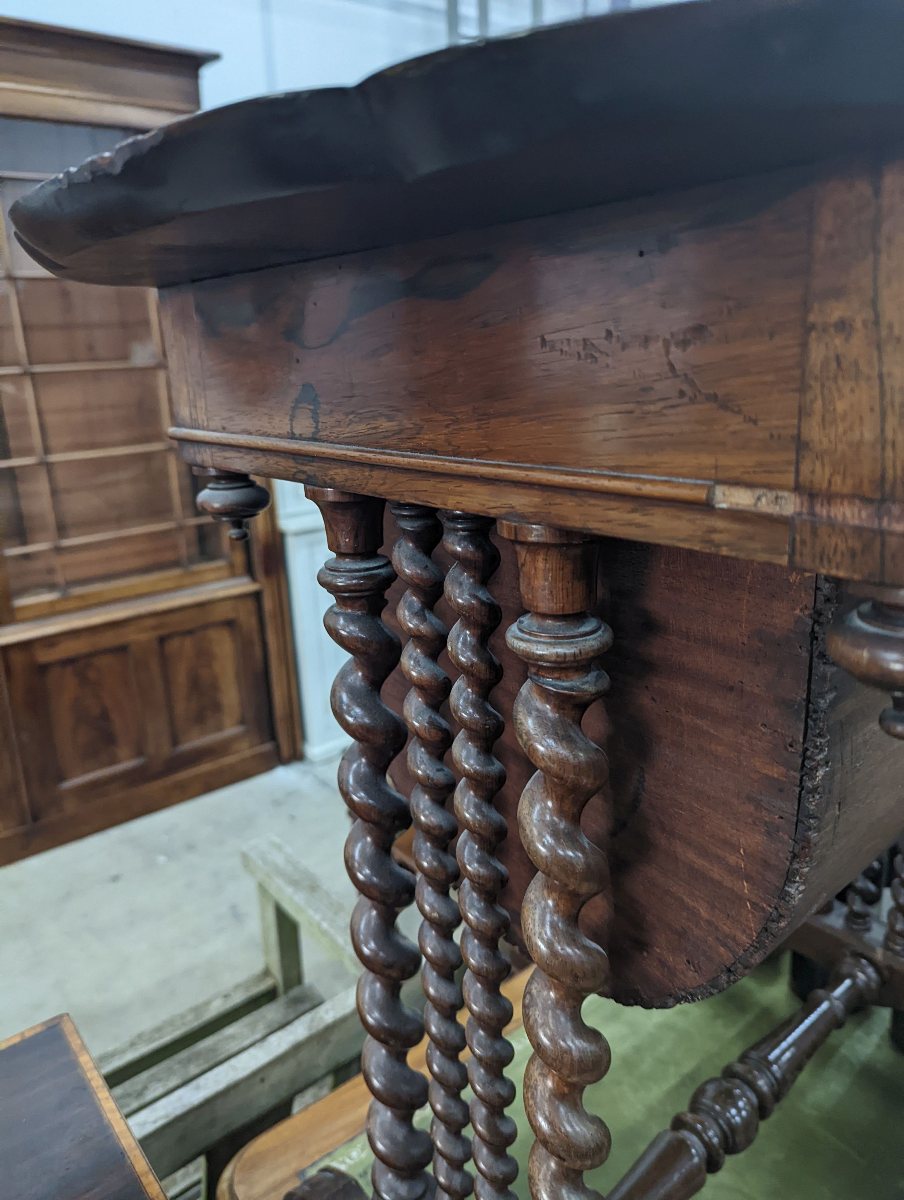 A 19th century Continental rosewood work table on spiral turned supports width 73cm, depth 45cm, height 71cm